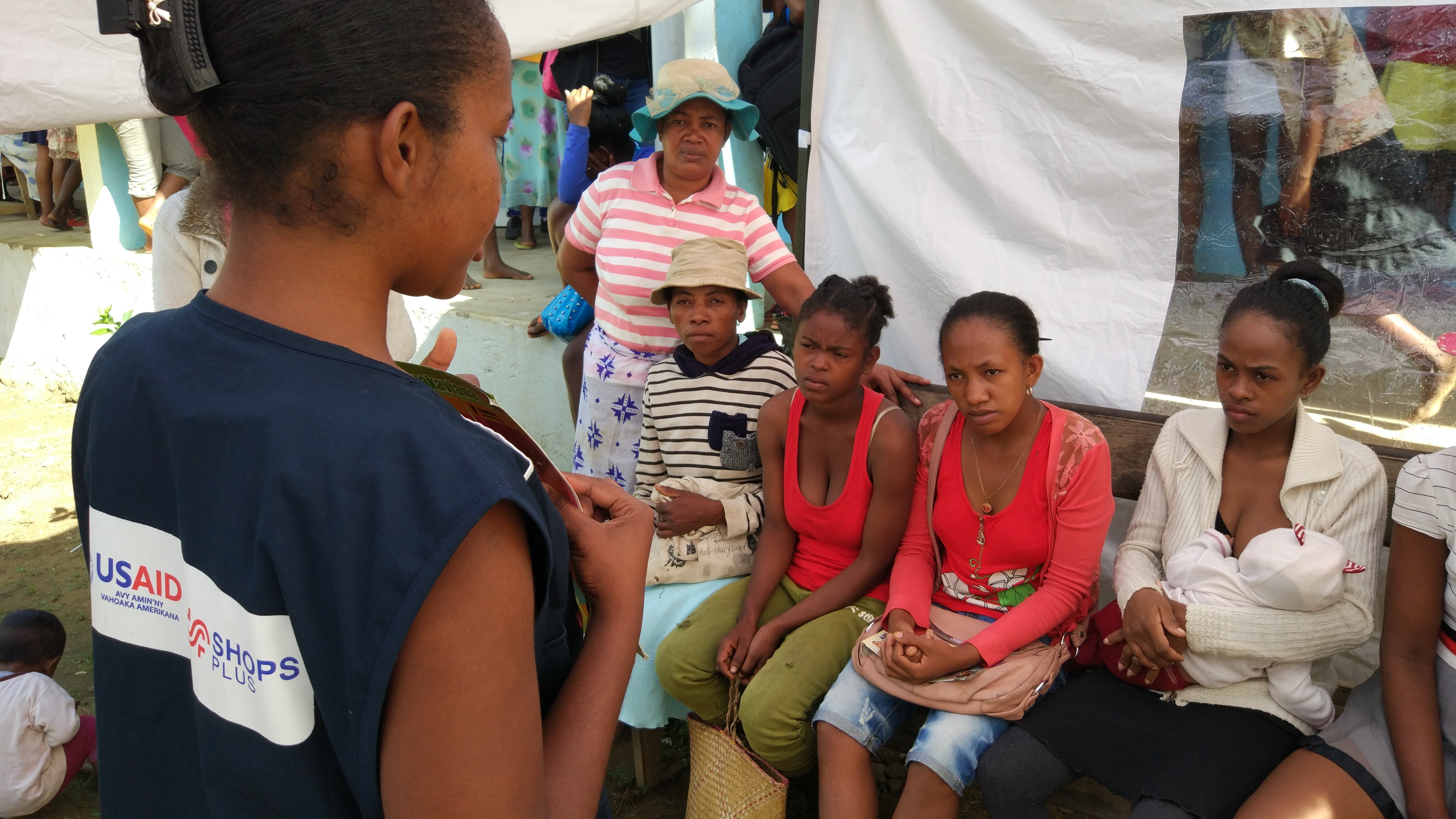 SHOPS Plus staff talking to women about family planning and their options