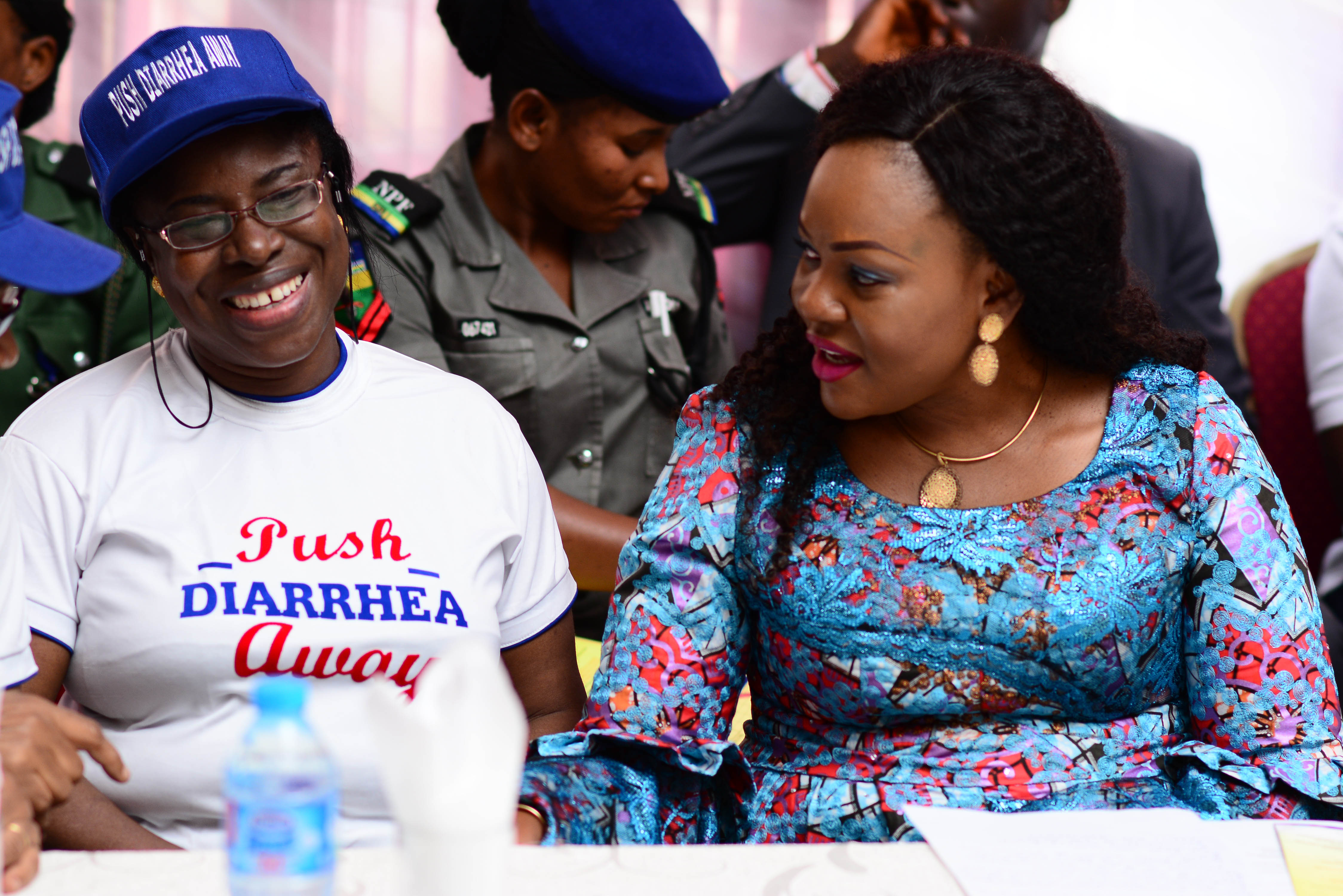 Dr. Eunice Ortom hands a baton to a wife of local government sole administrator, asking her to be an ORS and zinc advocate.