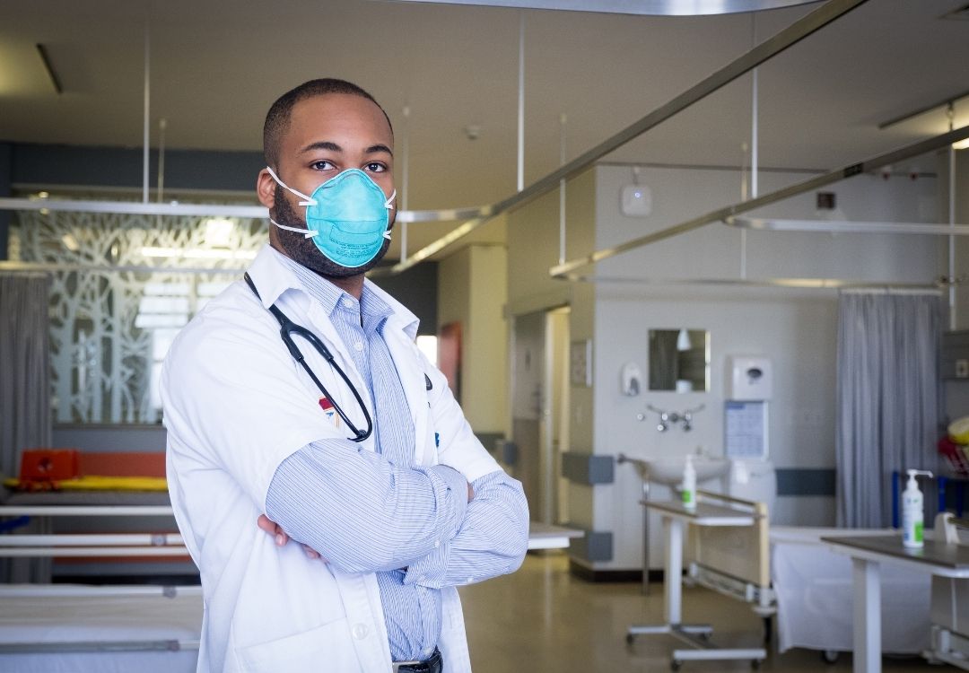 Doctor in a hospital wearing a mask