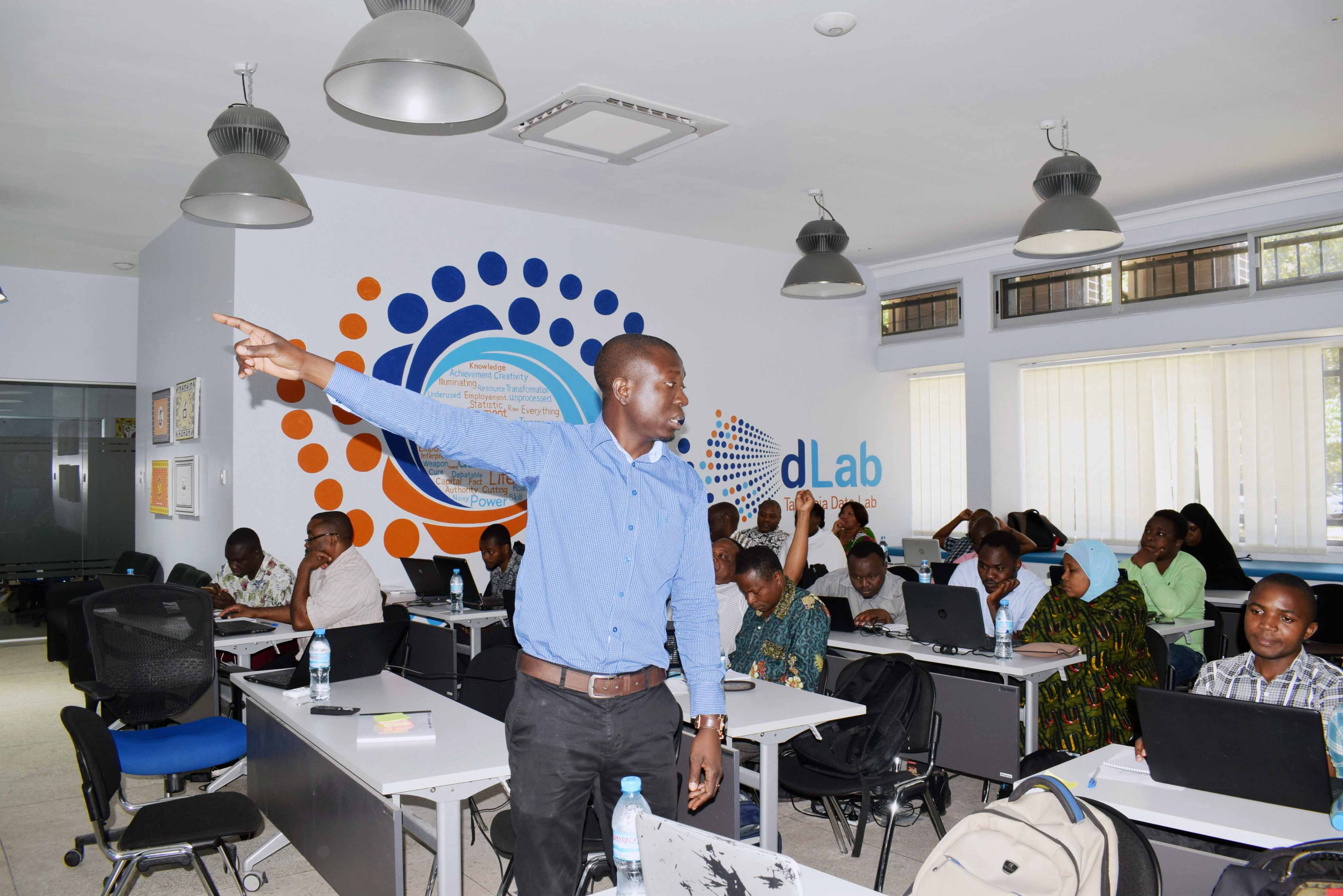 A presenter during the training of regional and district-level health management information systems officers in Tanzania.