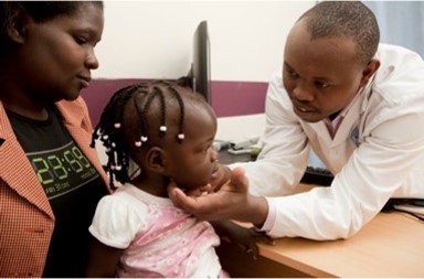 Provider with child and mom.