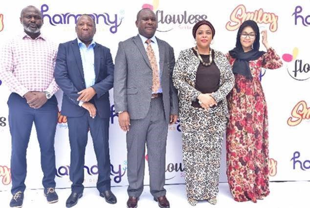 5 people posing for a picture at T-MARC launch