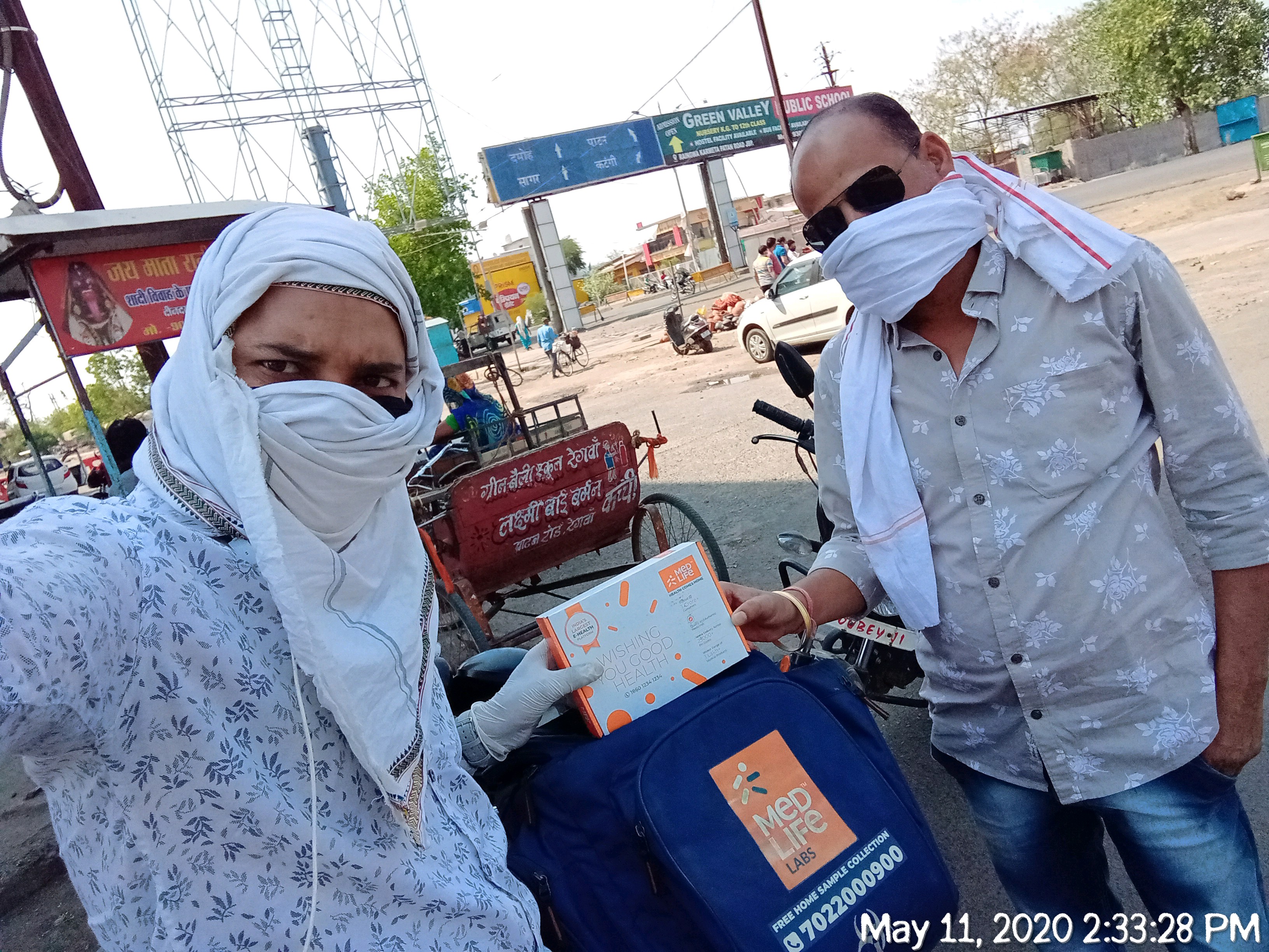 Woman delivering medication while wearing a mask