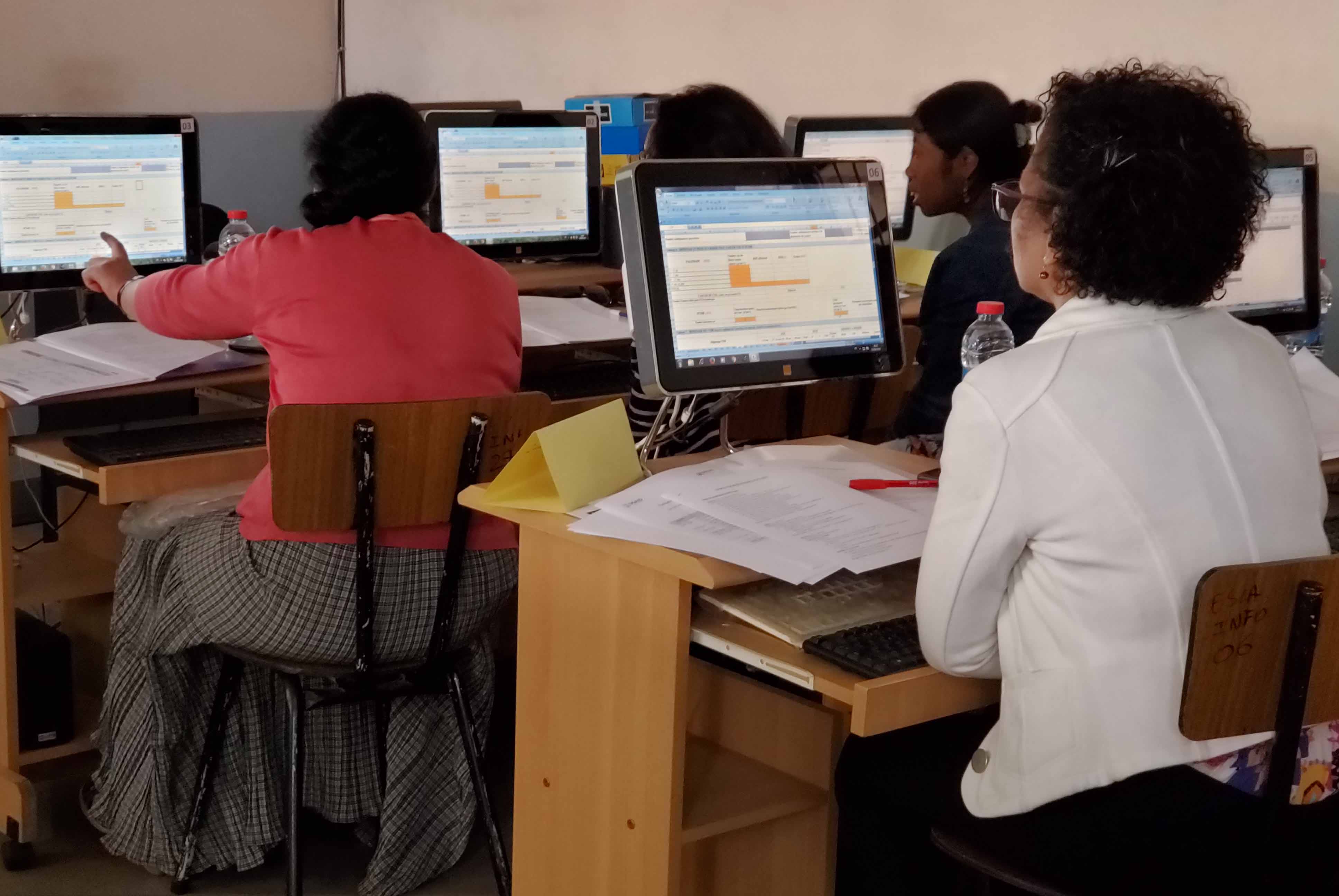 Participants using computers during the training