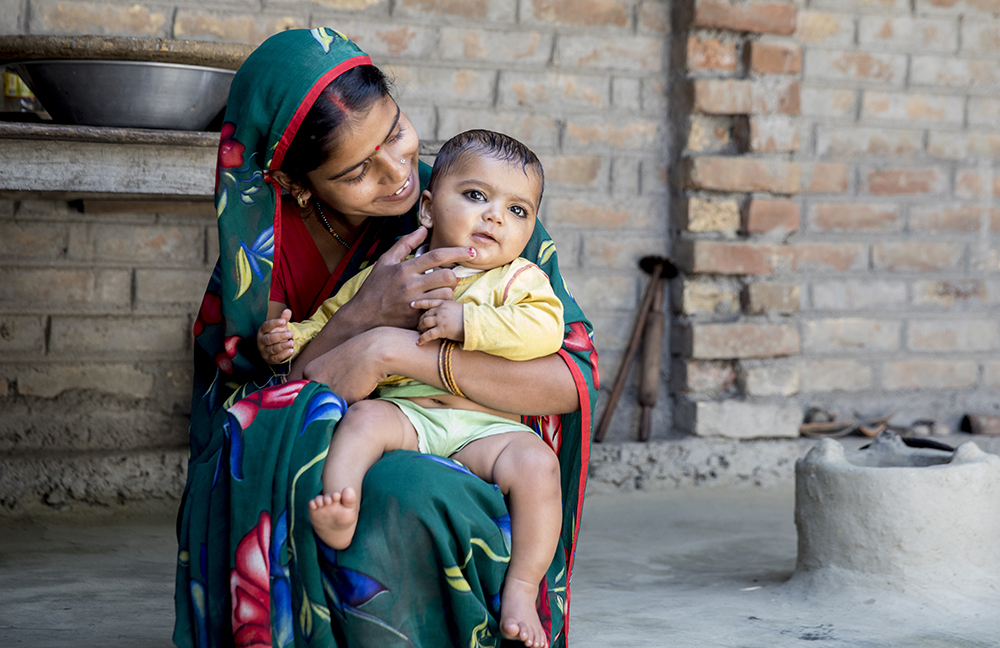 Indian Mom holding baby