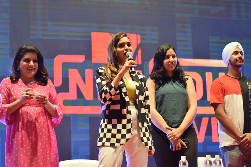 Youth influencer on the stage talking at the event