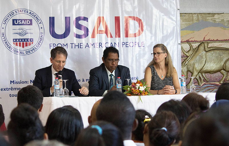 Dunlop, Andrianirinarison, and SHOPS Plus Francophone regional manager Bettina Brunner on stage at the trade fair.